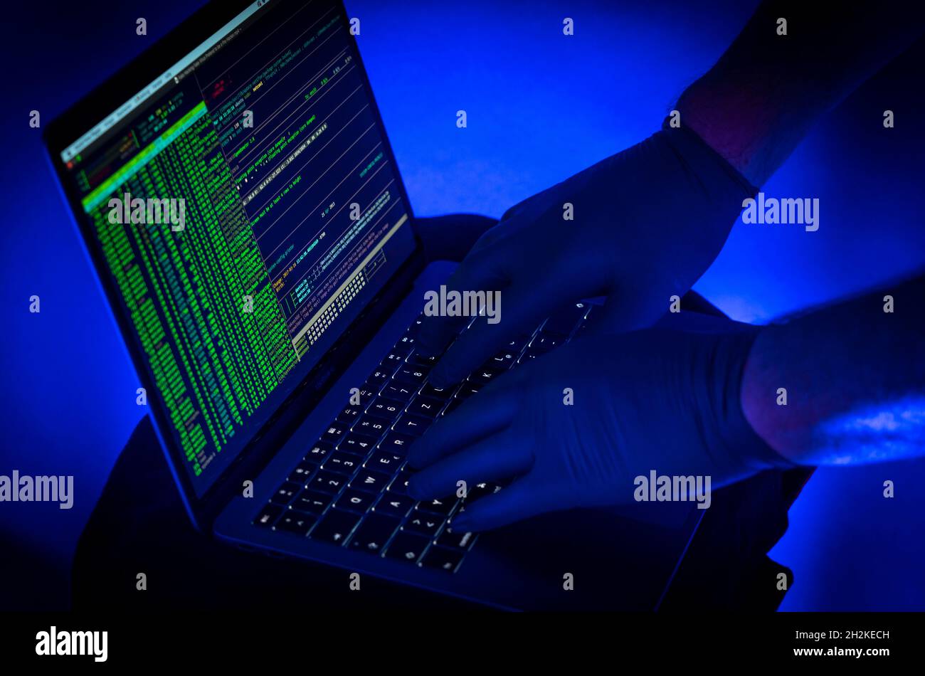 Symbolic image cyber attack, computer crime, cybercrime, computer hackers attack a network, computer, IT infrastructure Stock Photo