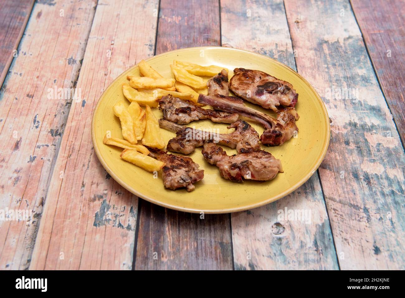 Popular Spanish recipe for fried suckling lamb chops with homemade