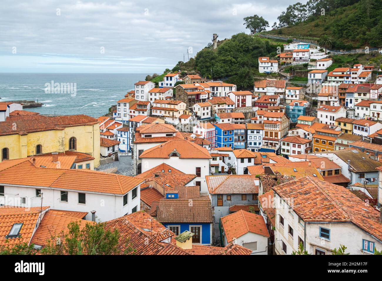 Red rooftops of a picturesque fishing village of Cudillero at the Cantabrian Sea coast in Asturias, Spain. Stock Photo
