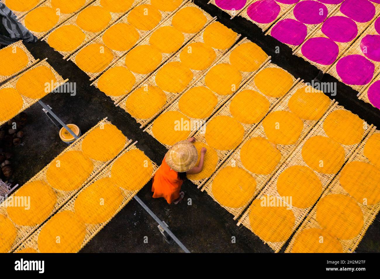 Workers are drying rice noodles in the sun Stock Photo - Alamy