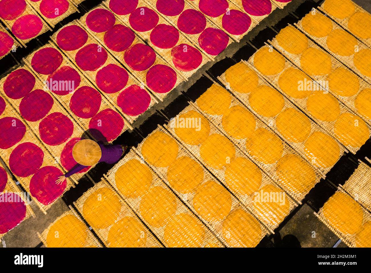 Workers are drying rice noodles in the sun Stock Photo - Alamy