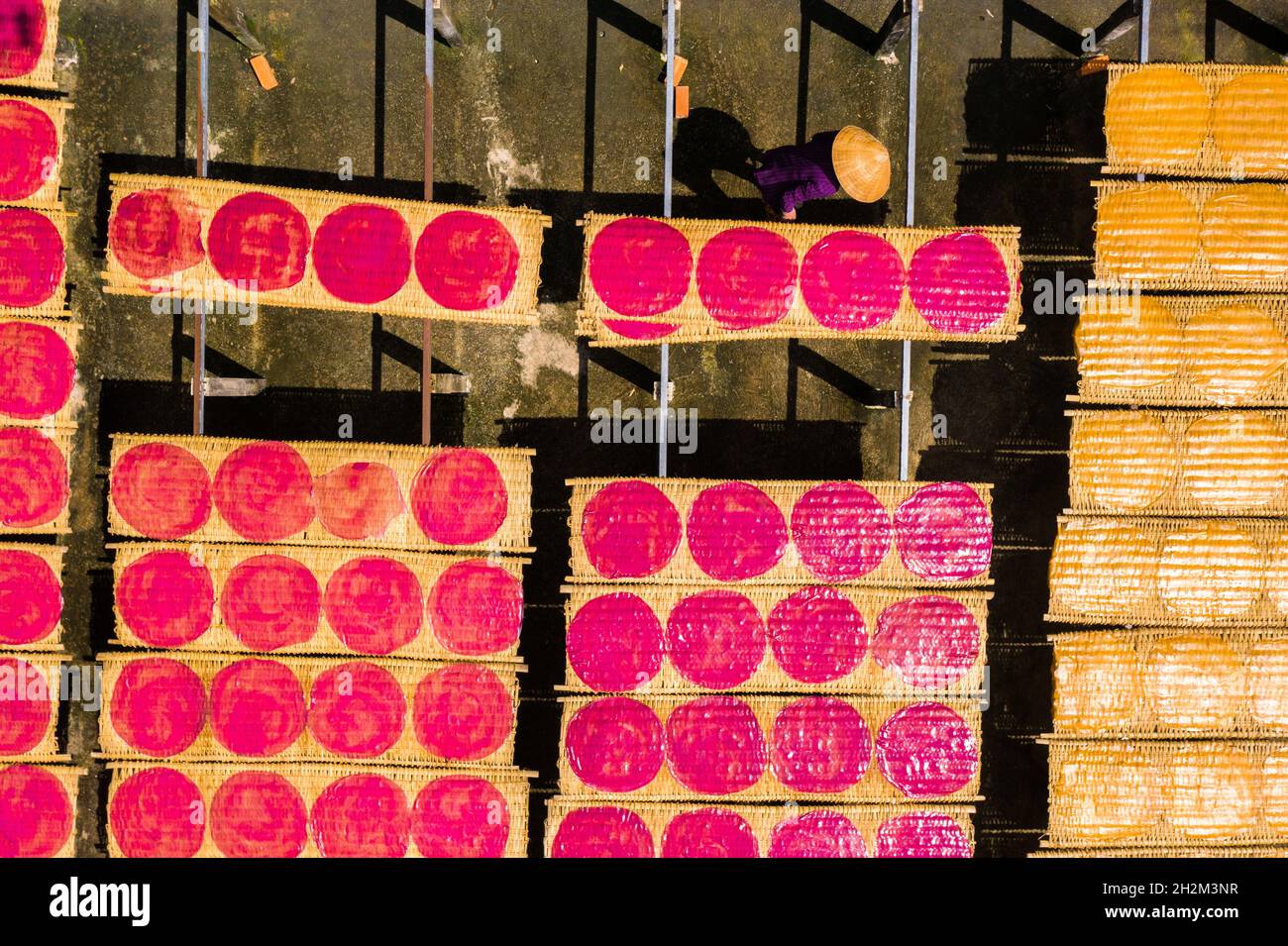 Workers are drying rice noodles in the sun Stock Photo - Alamy