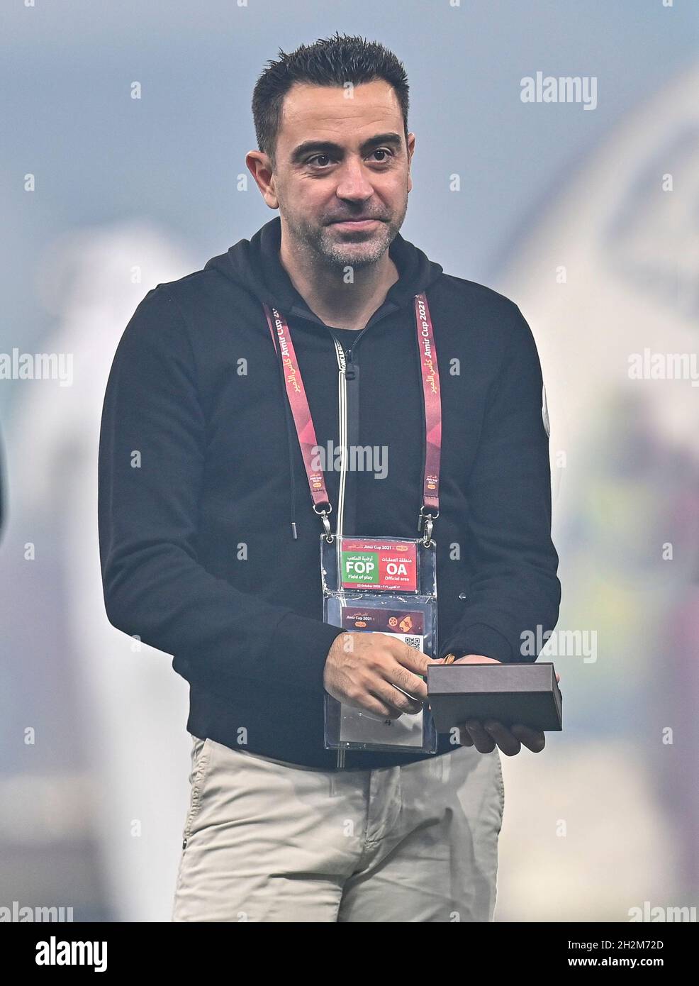 Doha, Qatar. 22nd Oct, 2021. Al Sadd's head coach Xavi celebrates after the team won the Amir Cup final football match between Al-Sadd and Al-Rayyan at the Al-Thumama Stadium in Doha, capital of Qatar, Oct. 22, 2021. Credit: Nikku/Xinhua/Alamy Live News Stock Photo