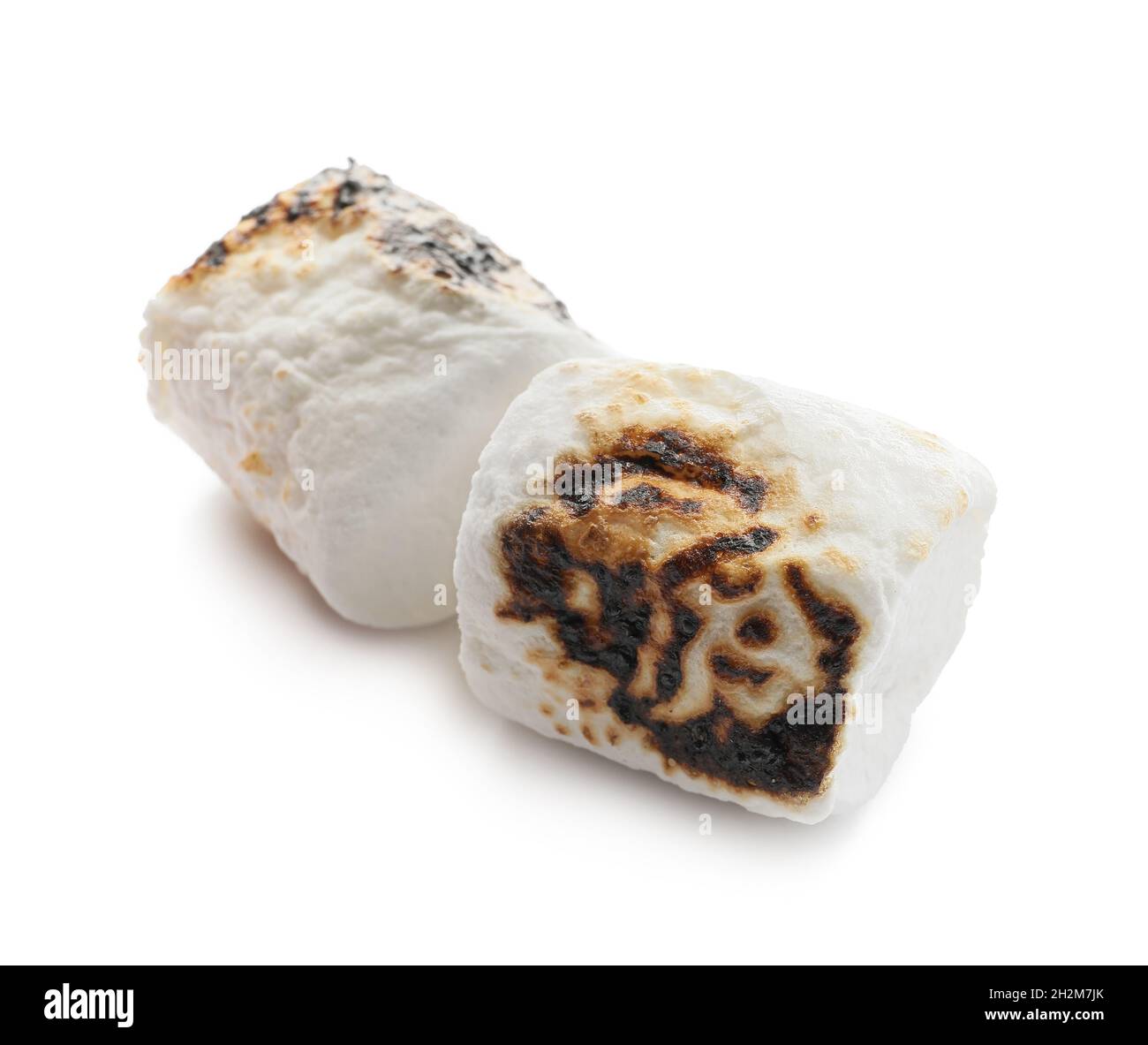 Tasty grilled marshmallow on white background Stock Photo - Alamy