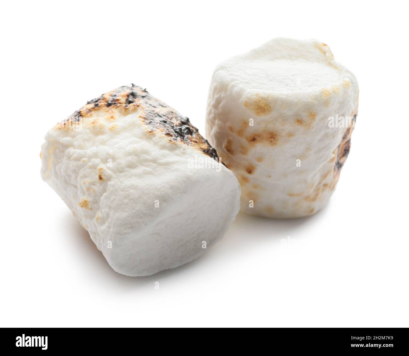 Tasty grilled marshmallow on white background Stock Photo - Alamy