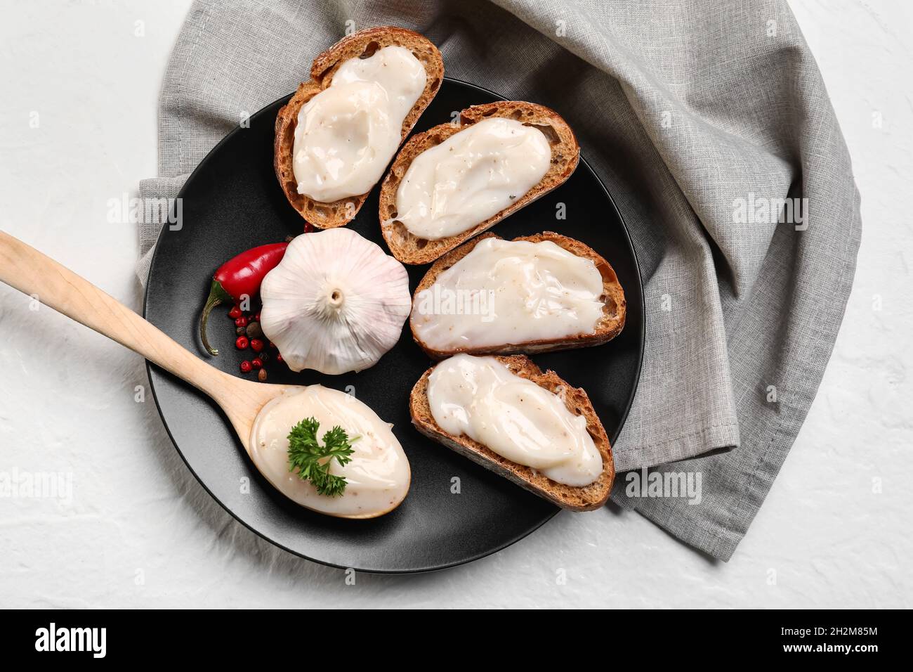 Plate of bread with lard spread on white background Stock Photo Alamy