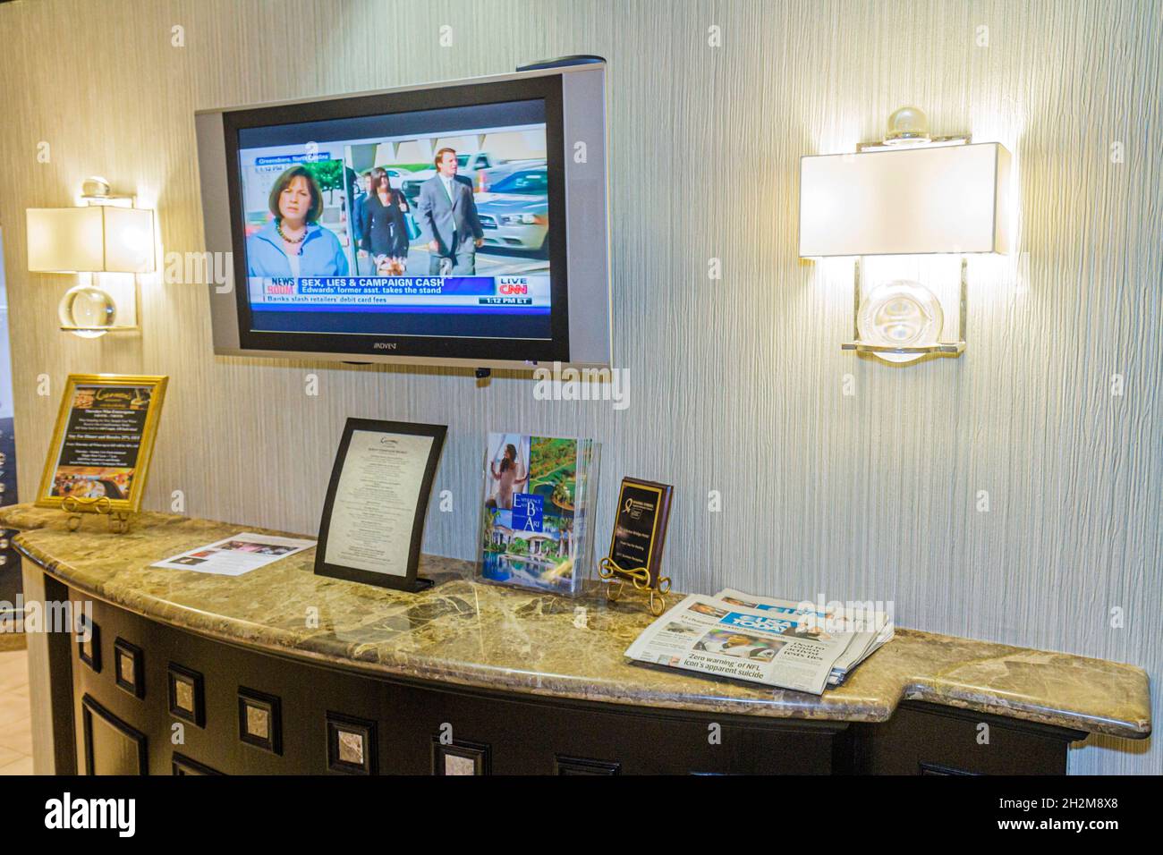 Boca Raton Florida,The Bridge,hotel lobby,widescreen digital TV television free USA Today newspaper,inside interior Stock Photo