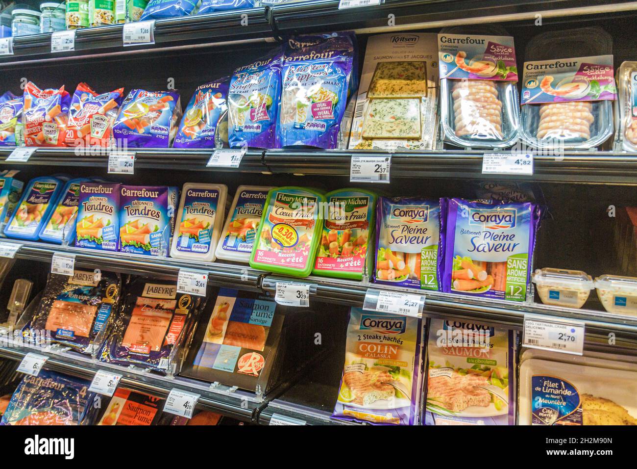 Paris France,Rue Jean-Baptiste Pigalle,Carrefour City supermarket grocery  store,food market marketplace selling display sale shelves pricing inside  Stock Photo - Alamy