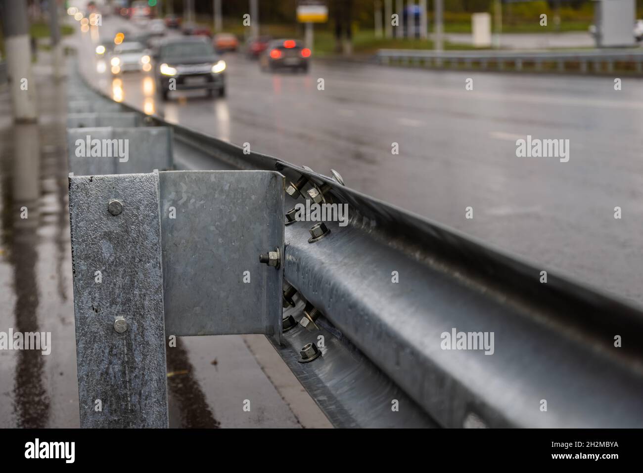 underscrewed nuts and bolts in highway road railing Stock Photo Alamy