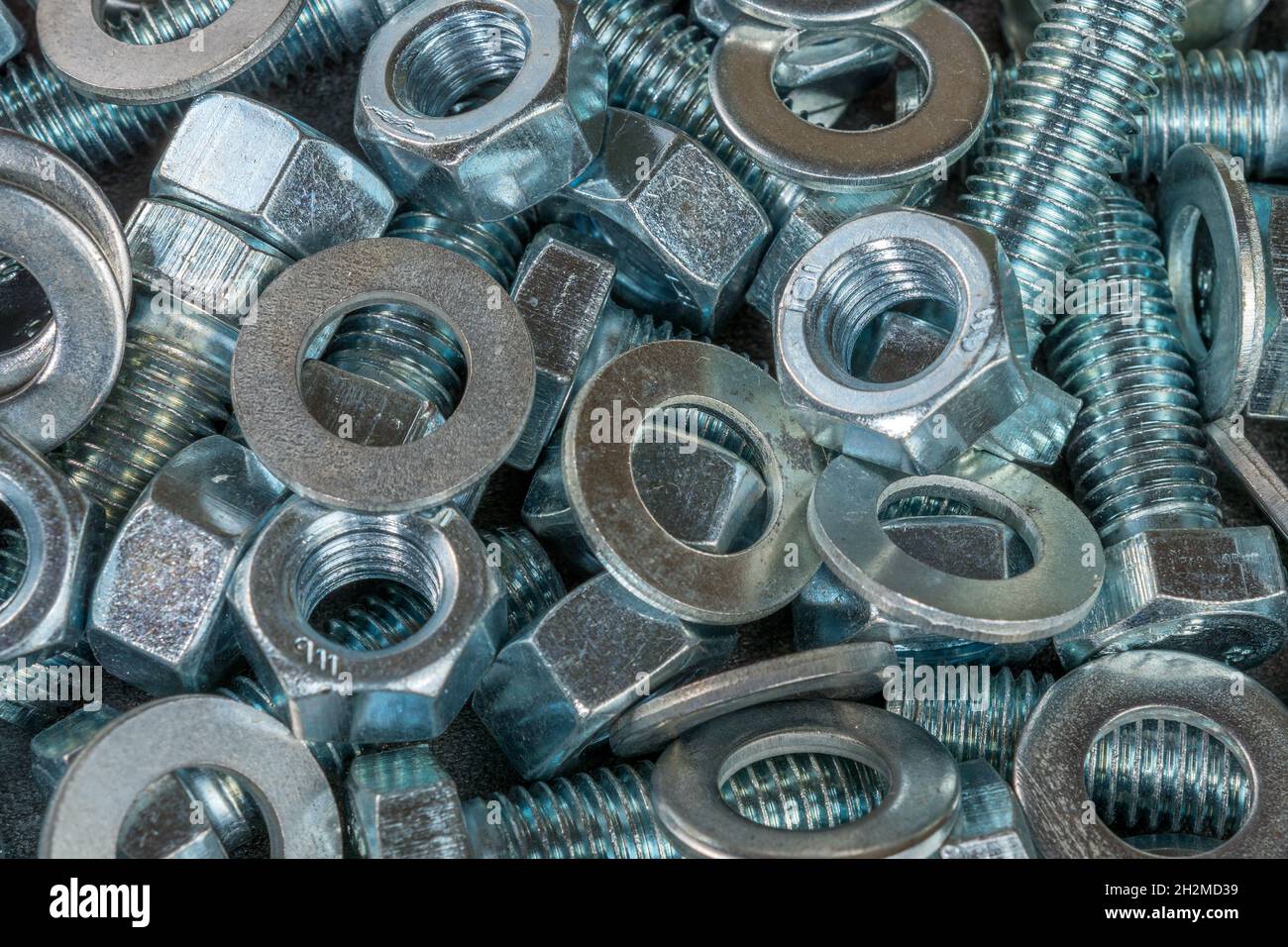 Bolts, washers and nuts closeup. Fasteners. Details for repair Stock