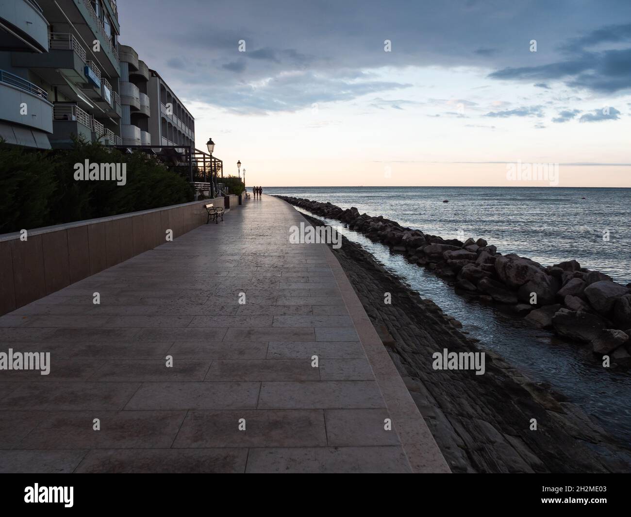 Grado Beach Promenade Nazario Sauro on a Summer Morning on the North Adriatic Sea in Italy Stock Photo