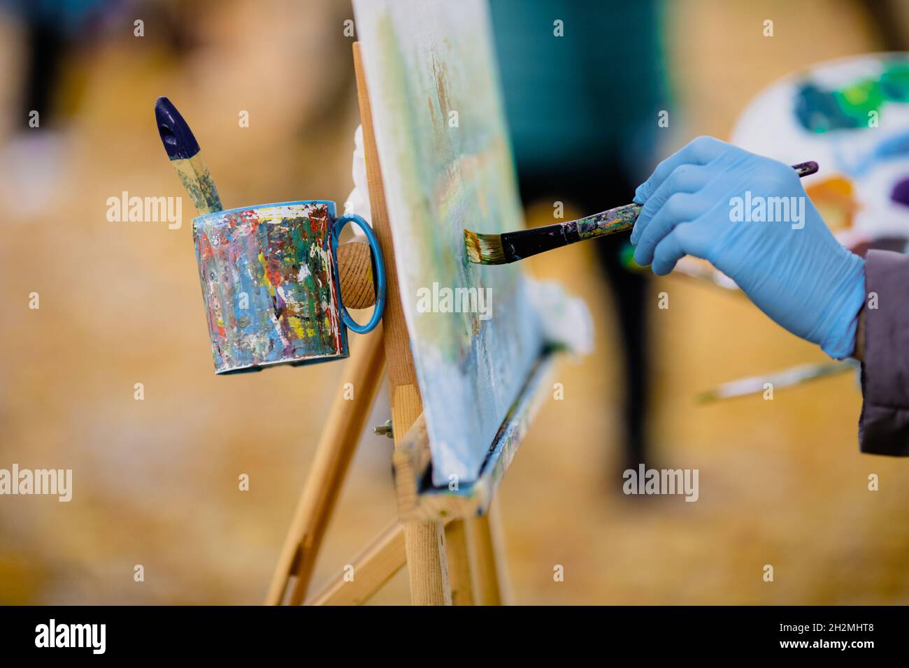 Shallow depth of field (selective focus) image with the hand of a ...