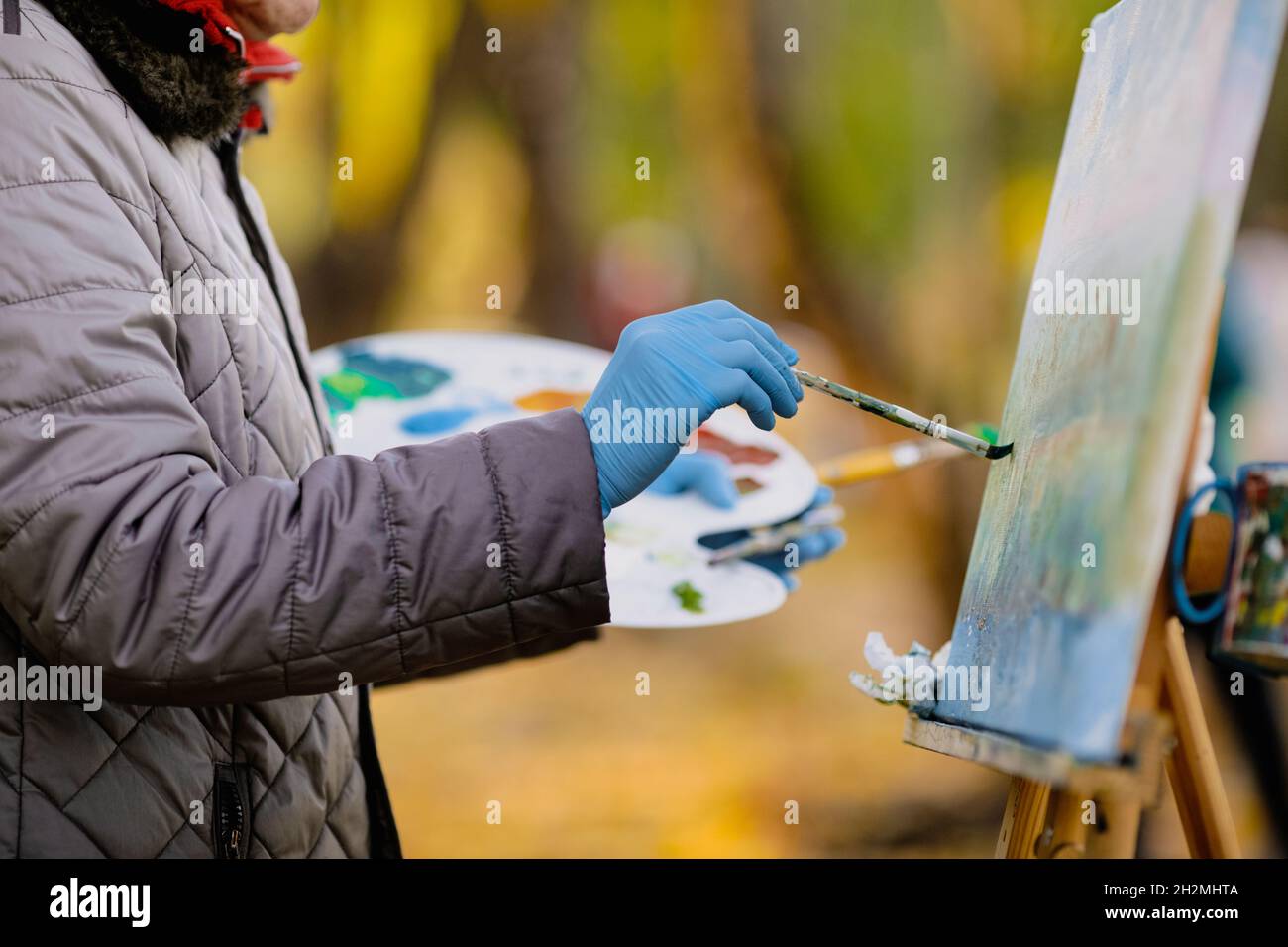 Shallow depth of field (selective focus) image with the hand of a ...