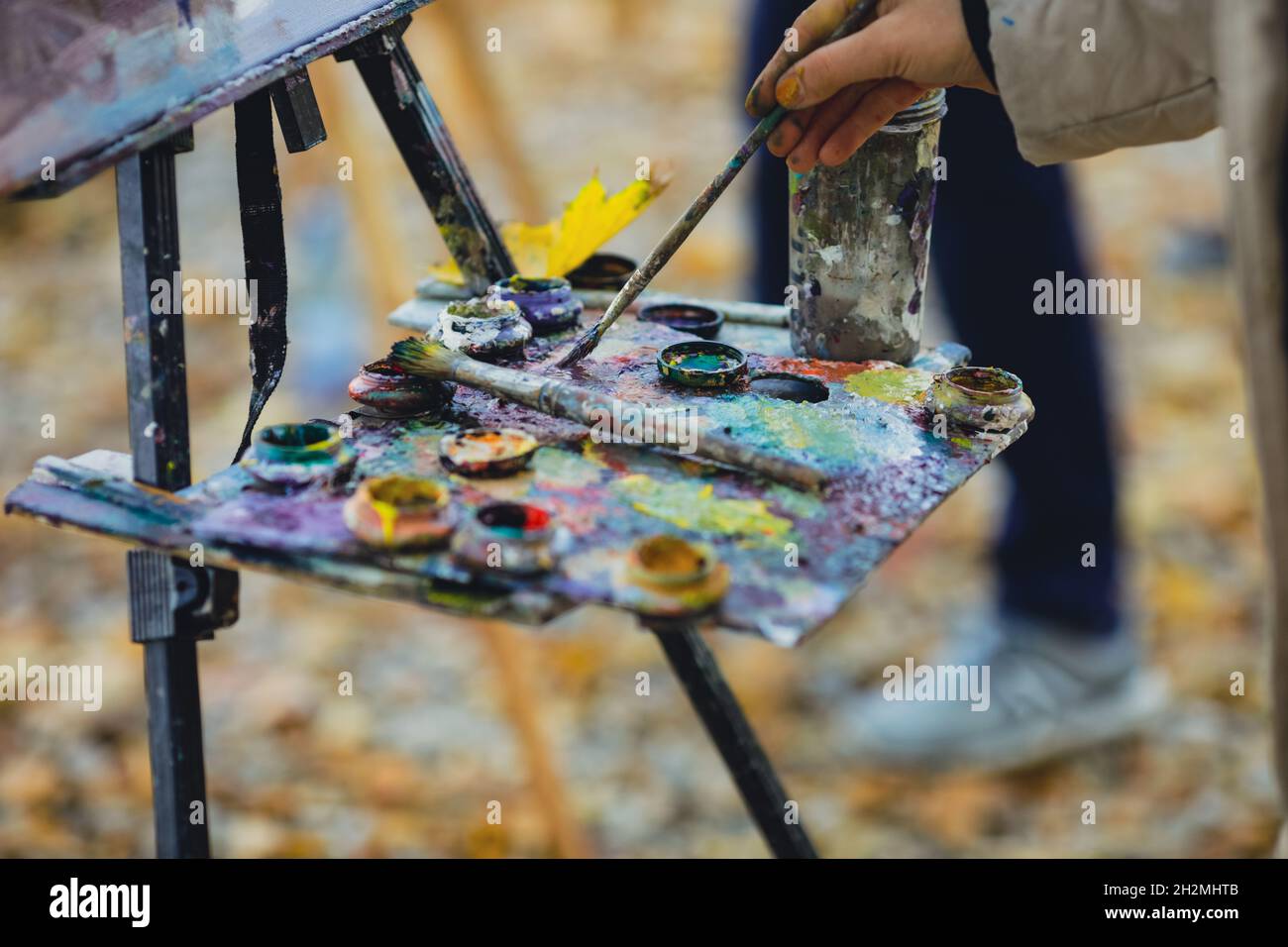 Shallow depth of field (selective focus) image with the hand of a ...