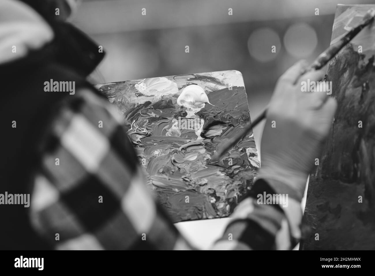 Shallow depth of field (selective focus) image with the hand of a ...