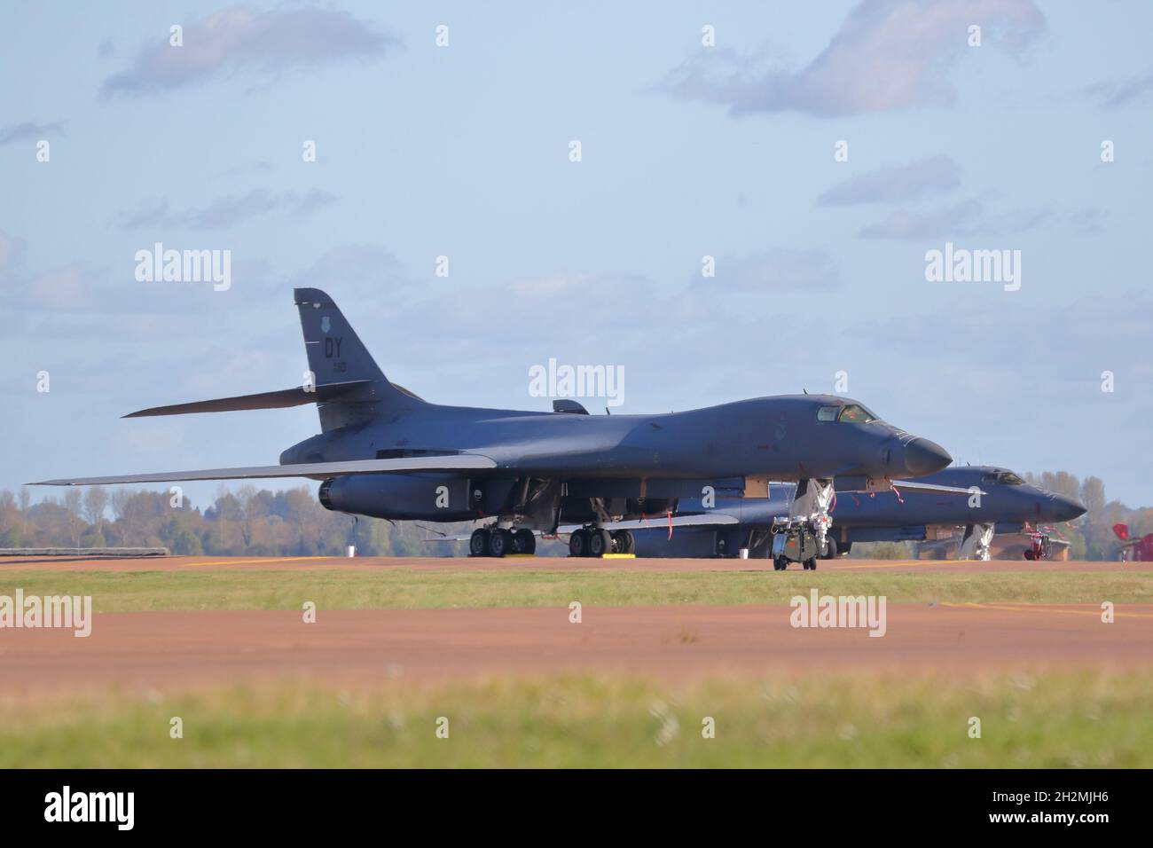 Two USAF Rockwell B1-B Lancer variable-sweep wing Strategic Bomber parked at RAF Fairford, UK Stock Photo