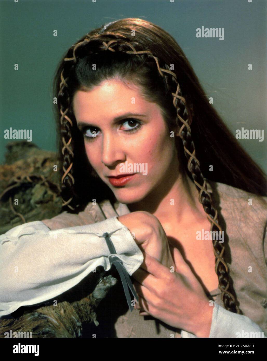 CARRIE FISHER in STAR WARS: EPISODE IV-A NEW HOPE (1977), directed by GEORGE LUCAS. Credit: LUCASFILM/20TH CENTURY FOX / Album Stock Photo