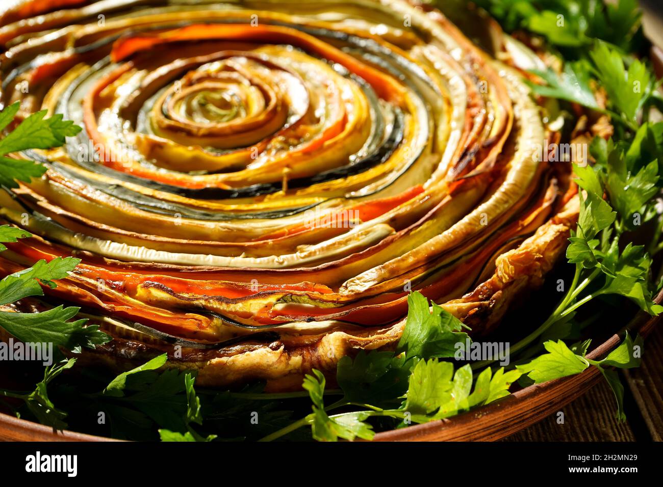 Vegetable pie Mexican sun. Round open pie made from zucchini, eggplant