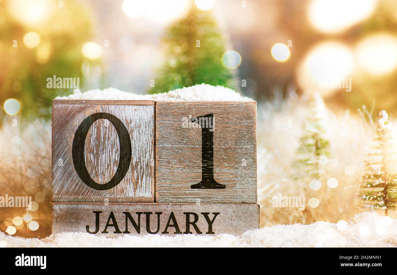 1st January sign for New Year and Christmas tree winter holiday festive background and ornaments Stock Photo