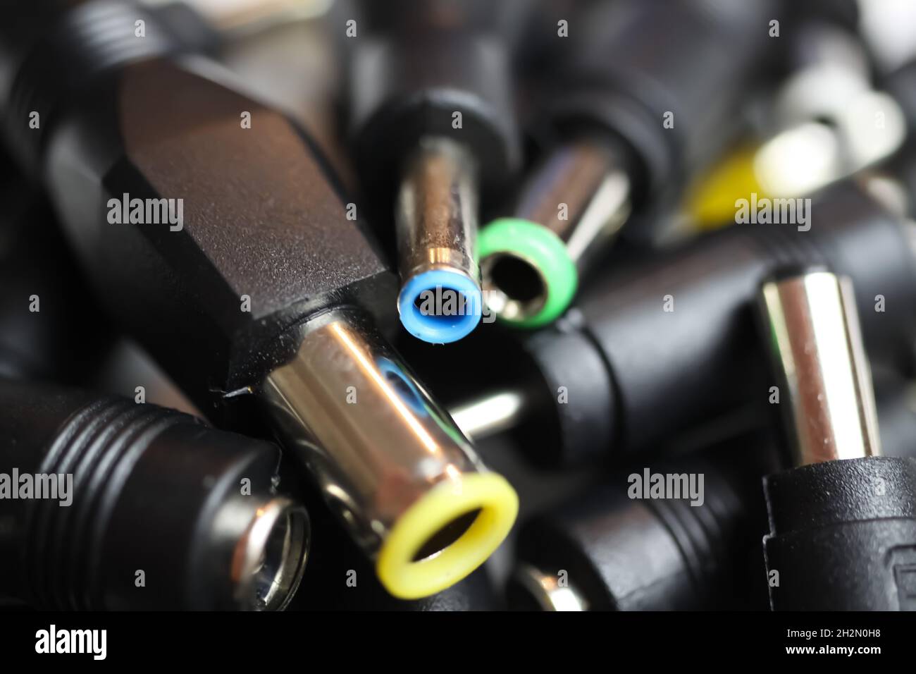 Closeup of selection many different DC barrel connectors pin plugs for