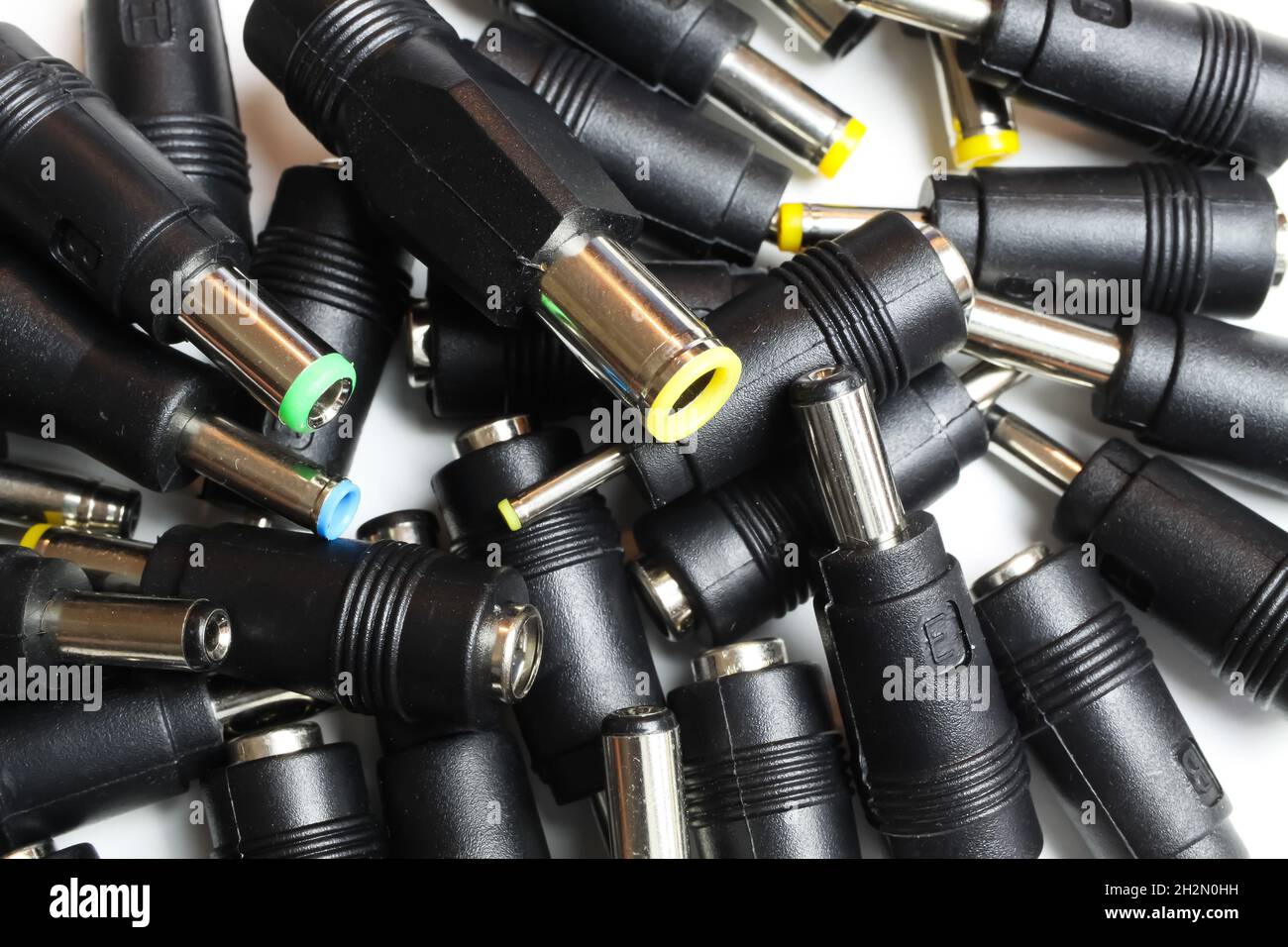 Closeup of selection many different DC barrel connectors pin plugs for