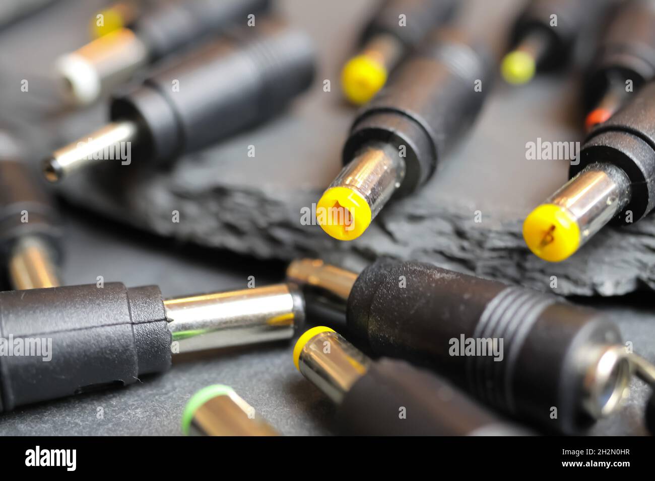 Closeup of selection many different DC barrel connectors pin plugs for