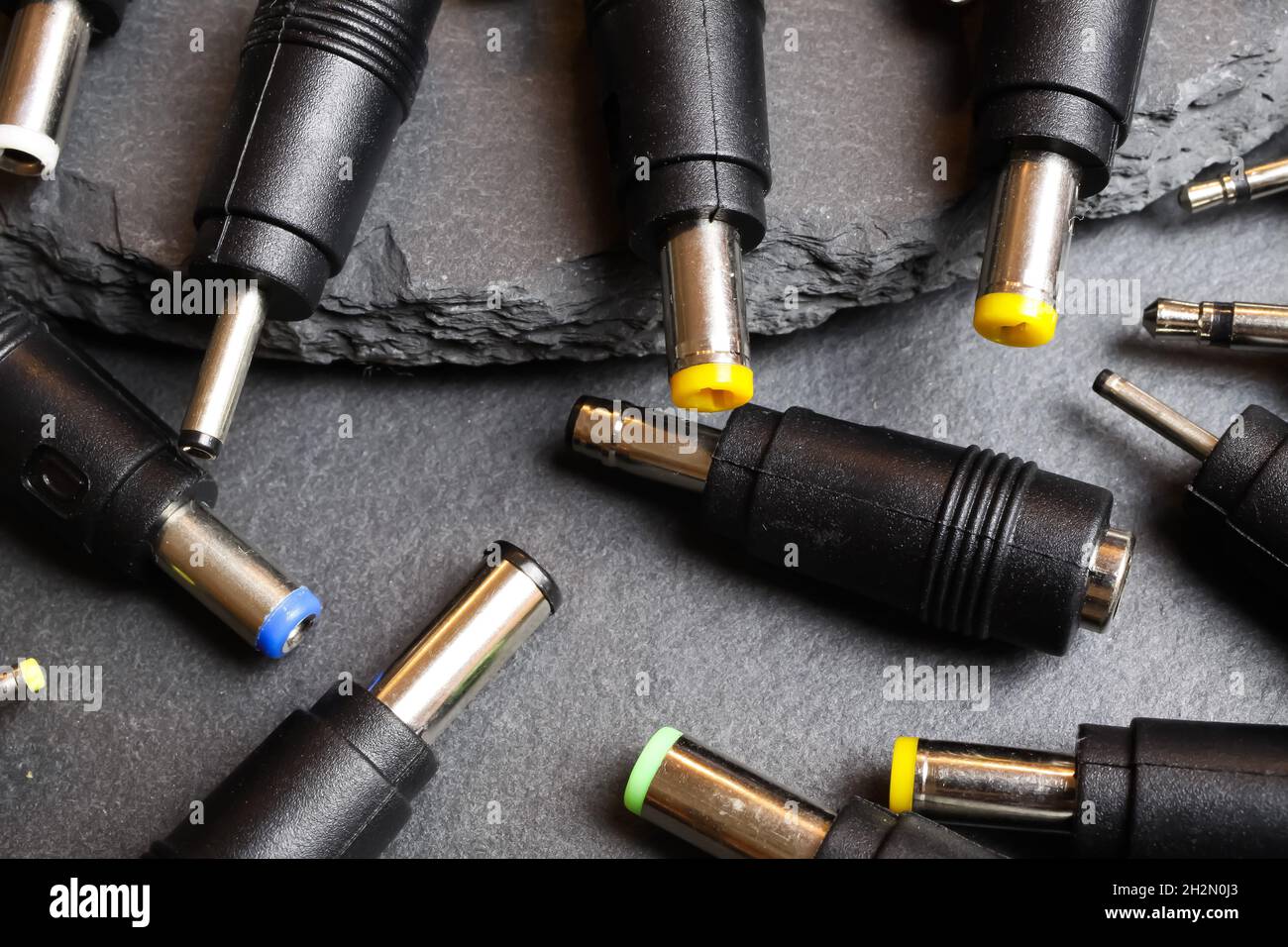Closeup of selection many different DC barrel connectors pin plugs for
