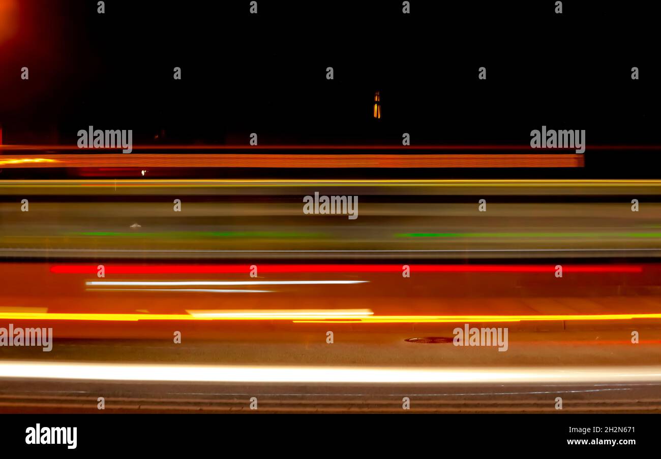 Vehicle light trails at night Stock Photo
