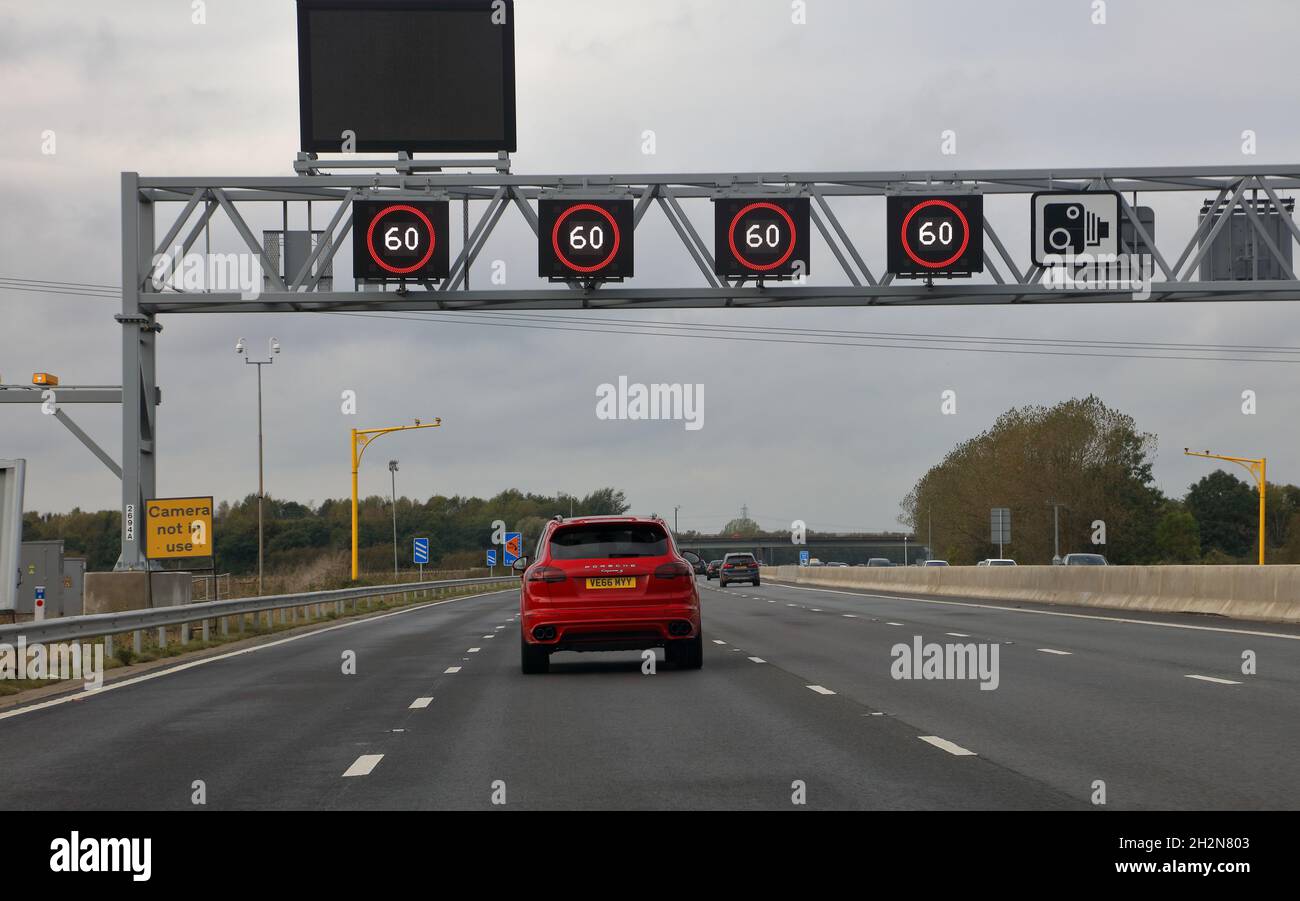 Sections of the new M4 smart Motorway around Reading in Berkshire with four driving lanes and new signage with digital displays. Stock Photo