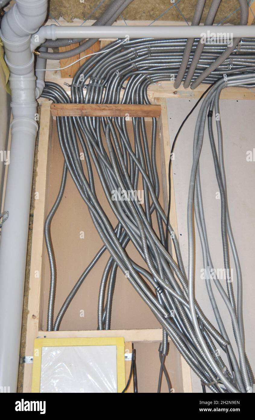 Electrical wiring. Electric wire installation in house. Stock Photo