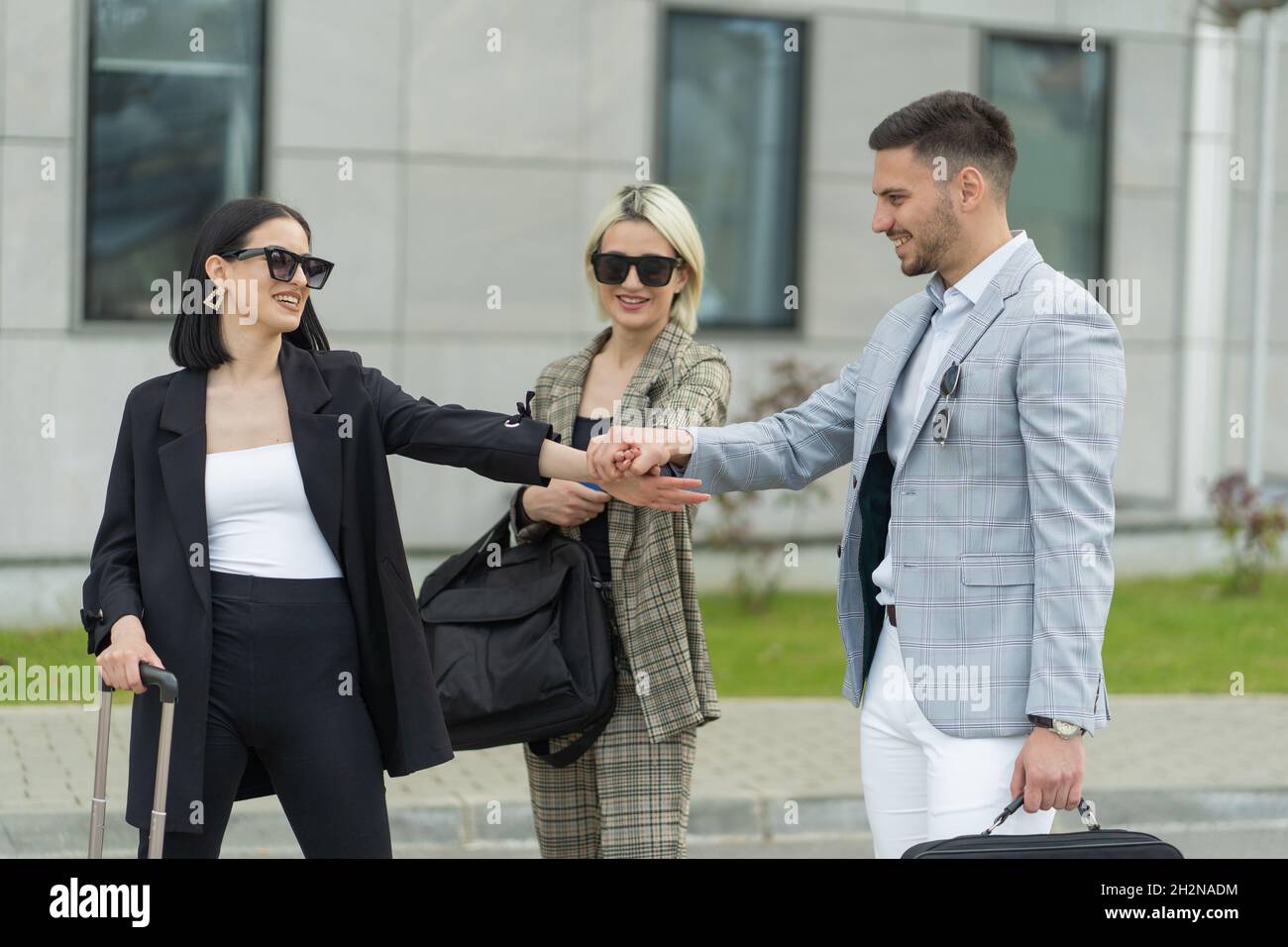 Thee Casual Dressed Business People Have A Deal An They Put The Hands