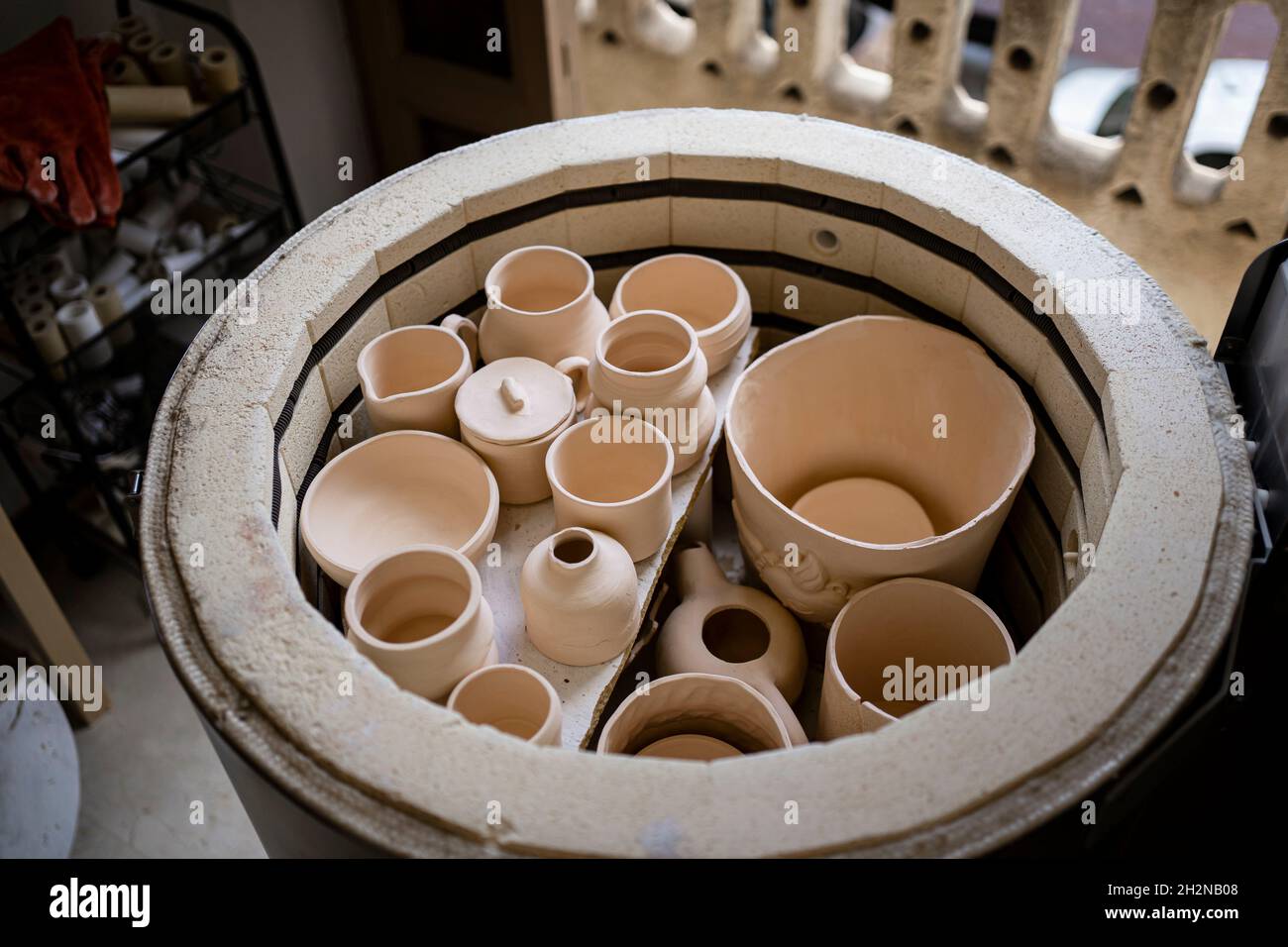 Collection of ceramics pottery in container Stock Photo - Alamy