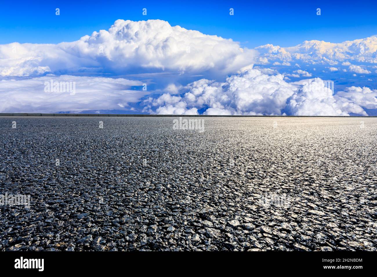 Empty asphalt road and blue sky with white clouds scenery Stock Photo ...