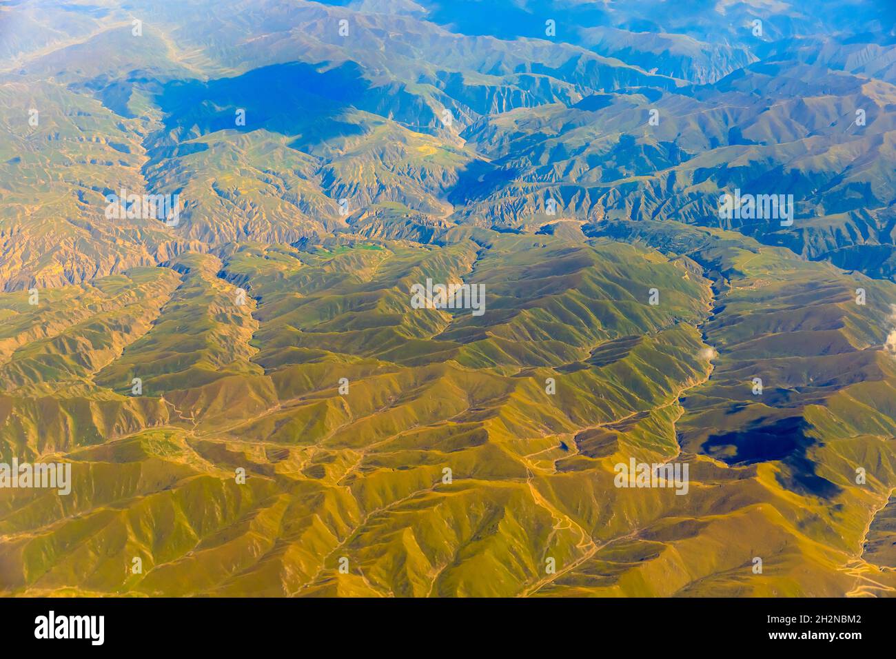 Aerial view of the green mountain scenery. Stock Photo