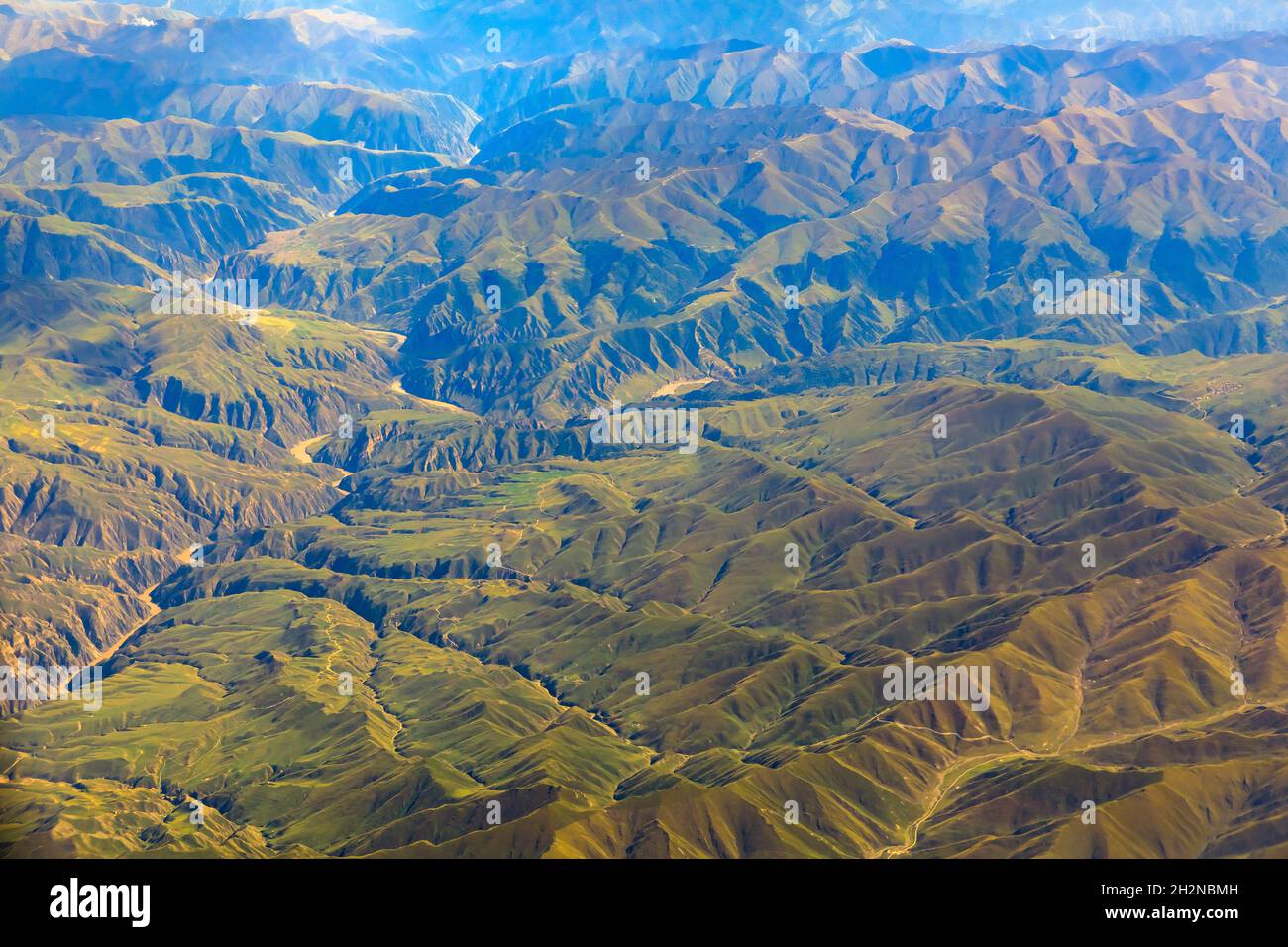 Aerial view of the green mountain scenery Stock Photo - Alamy