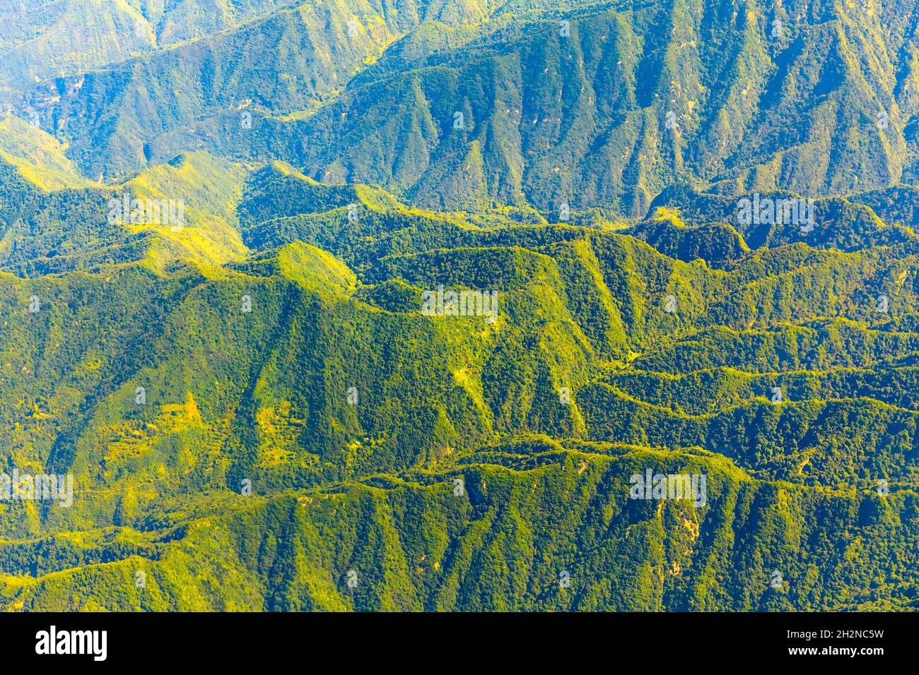 Aerial view of the green mountain scenery Stock Photo - Alamy