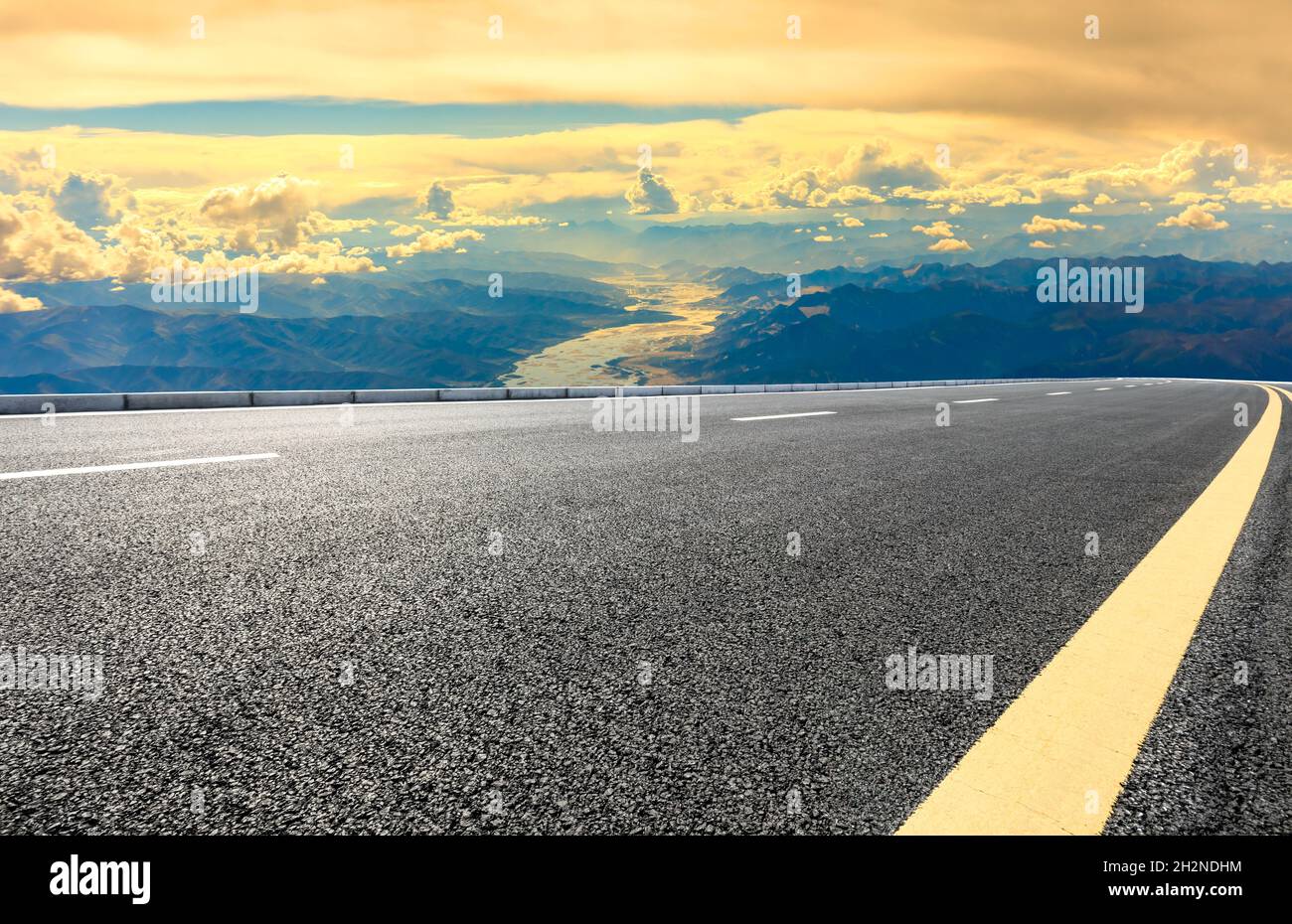 Asphalt road and mountain with sky clouds landscape Stock Photo - Alamy