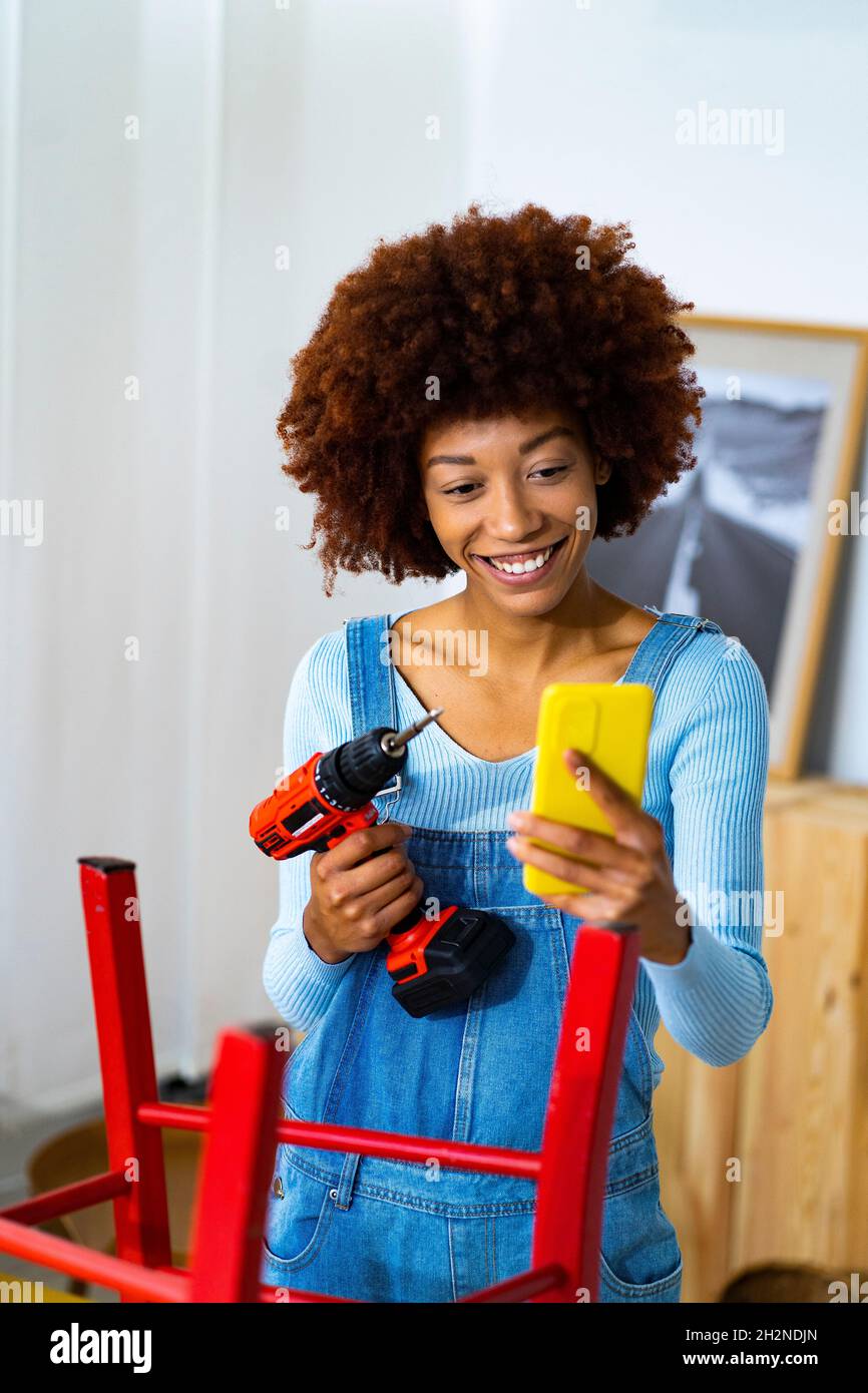 Diy woman screwdriver hi res stock photography and images Alamy