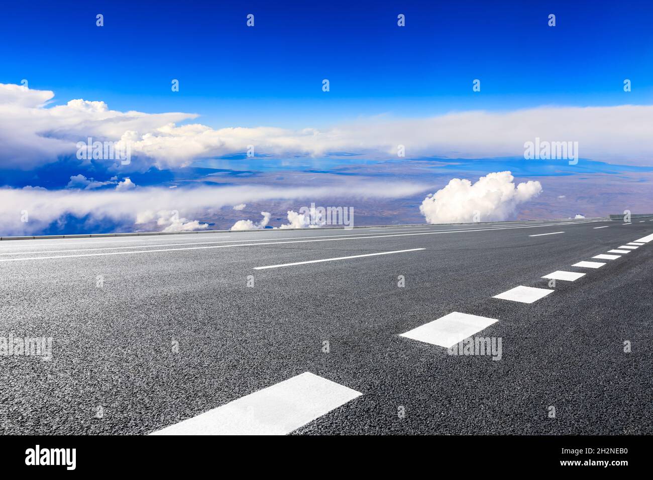 Empty asphalt road and blue sky with white clouds scenery Stock Photo ...