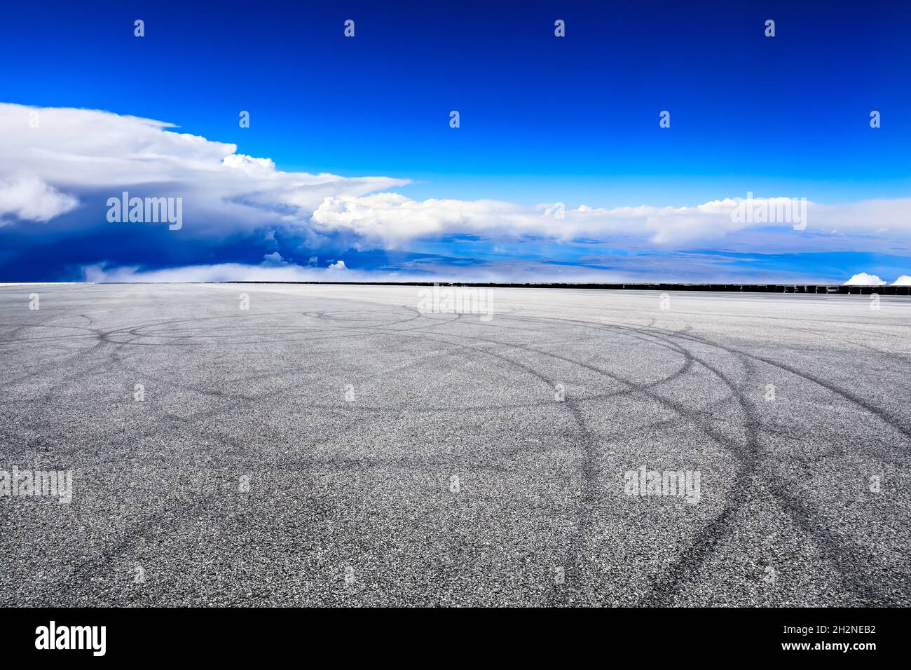 Empty asphalt road and blue sky with white clouds scenery Stock Photo ...