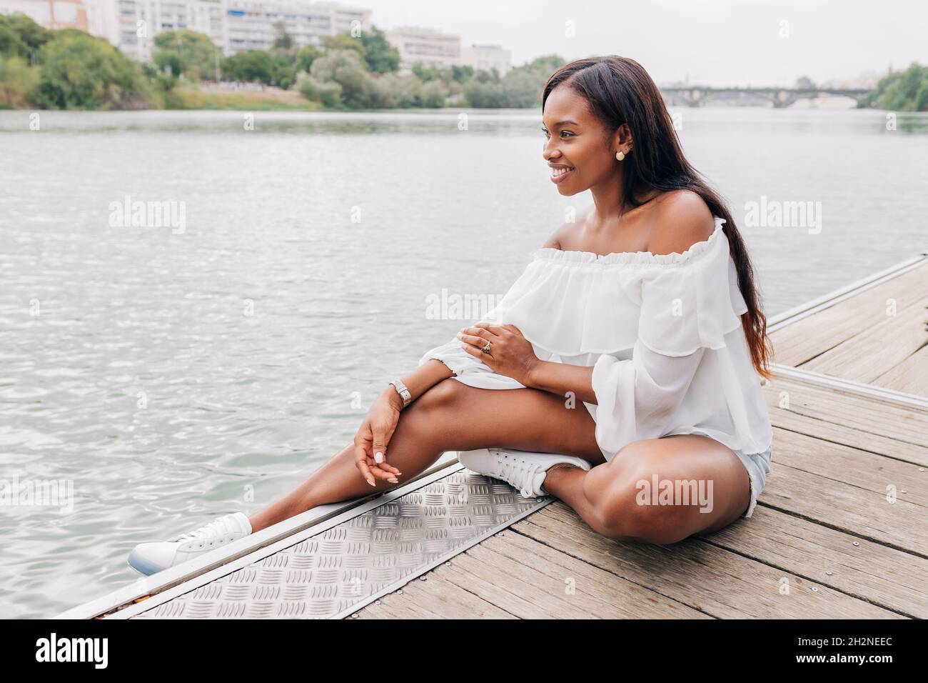 Adult woman african descent sitting hi-res stock photography and images ...