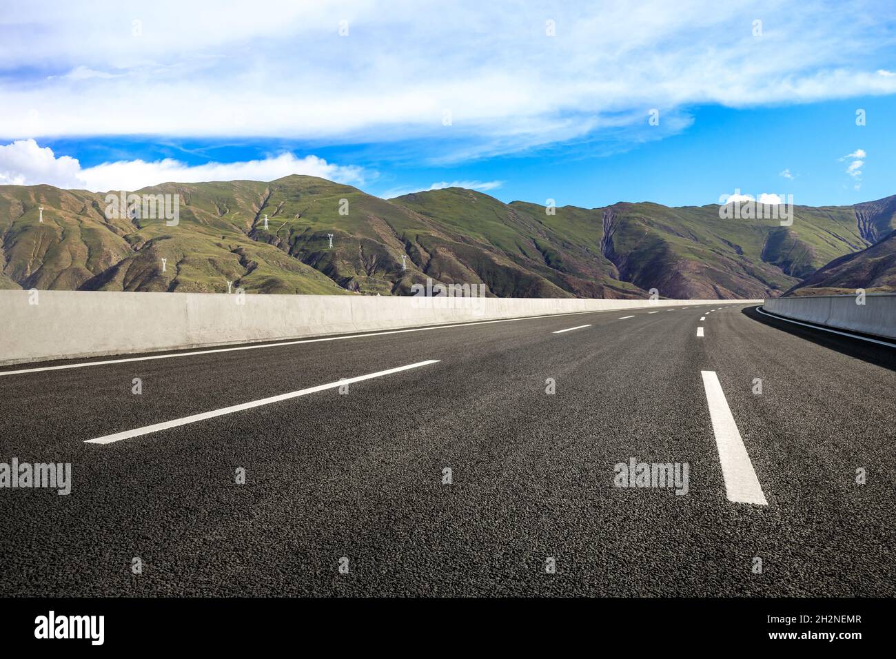 Asphalt road and mountain with sky clouds landscape Stock Photo - Alamy