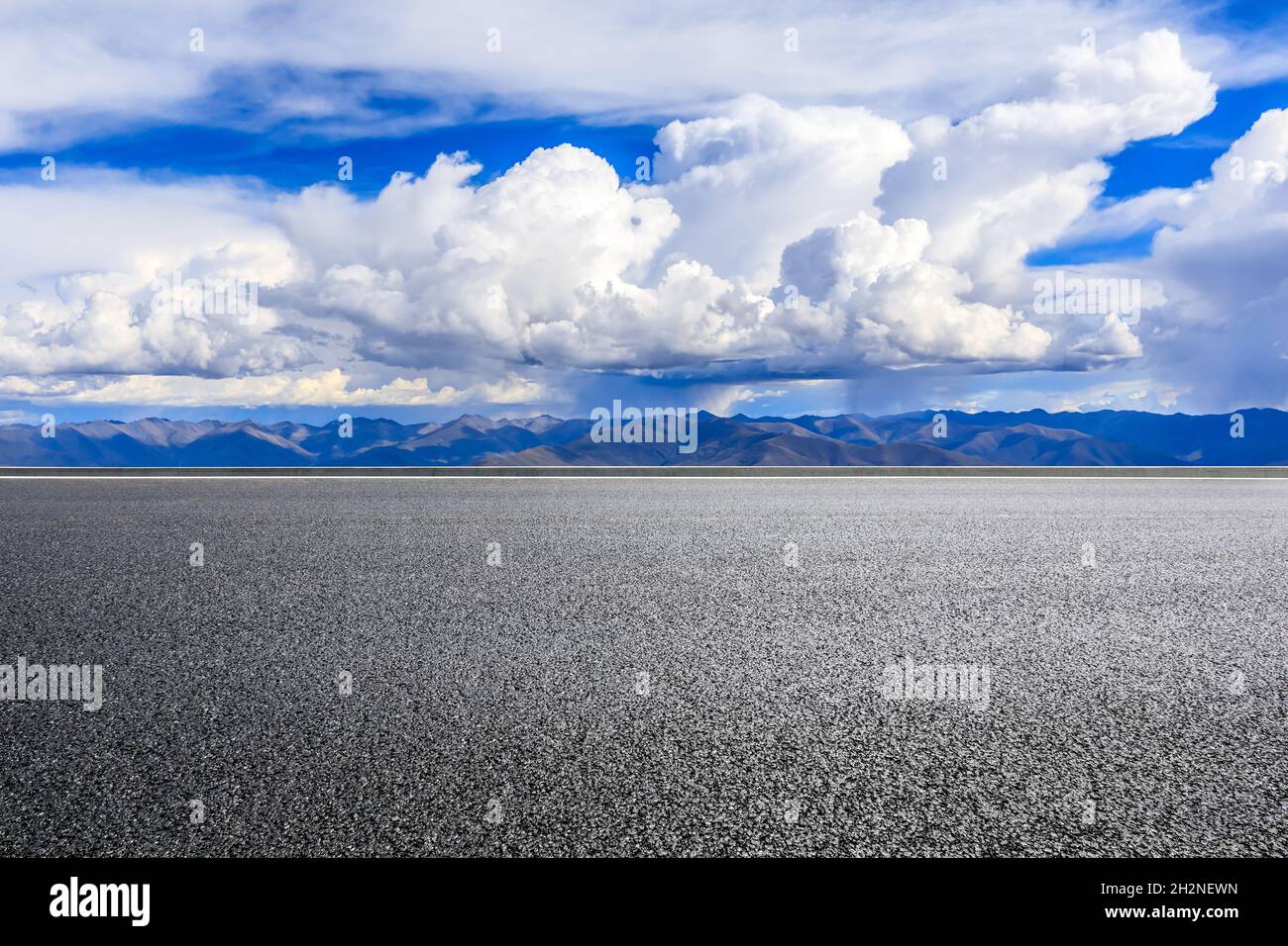Asphalt road and mountain with sky clouds landscape Stock Photo - Alamy