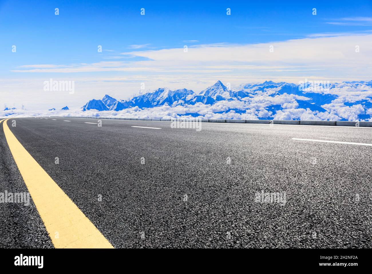 Asphalt road and mountain with sky clouds landscape Stock Photo - Alamy