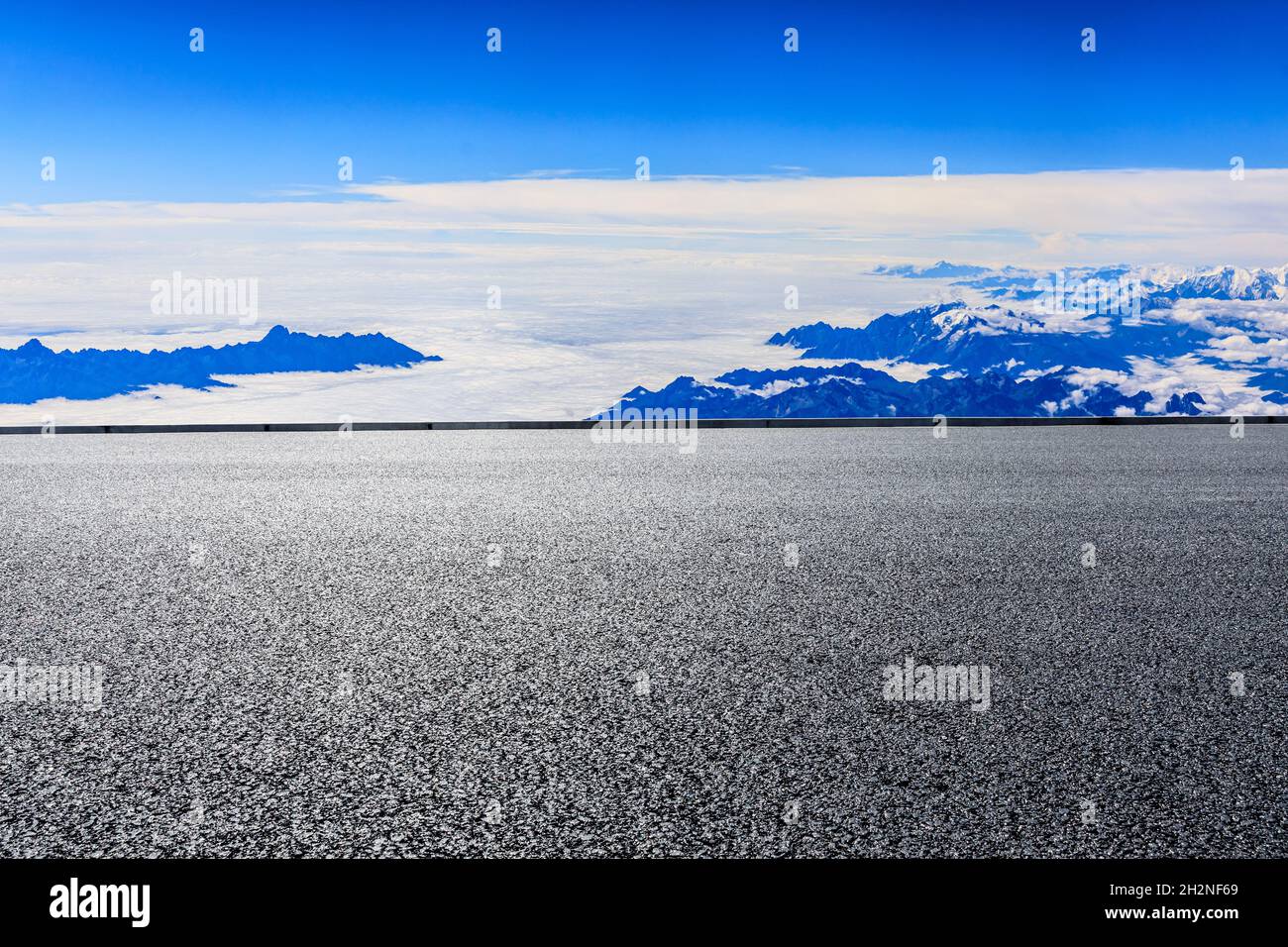 Asphalt road and mountain with sky clouds landscape Stock Photo - Alamy