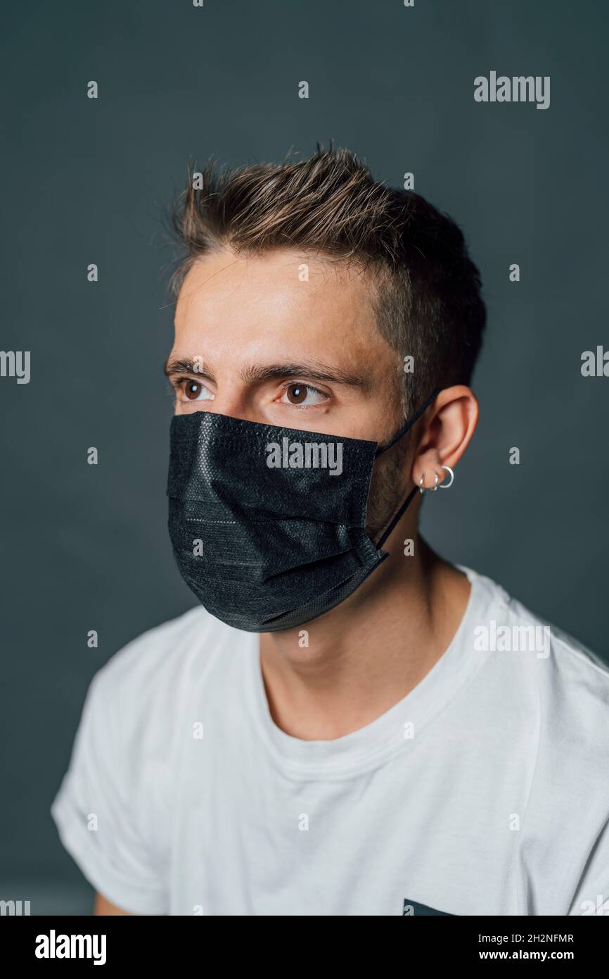 Blond young man mask hi-res stock photography and images - Alamy