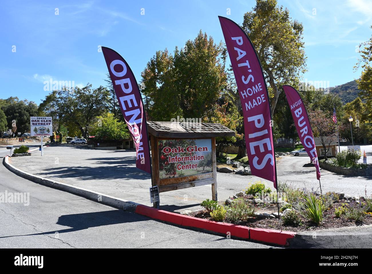 OAK GLEN, CALIFORNIA - 10 OCT 2021: Signs along Oak Glen Road in the San Bernardino Mountains foothills. Stock Photo