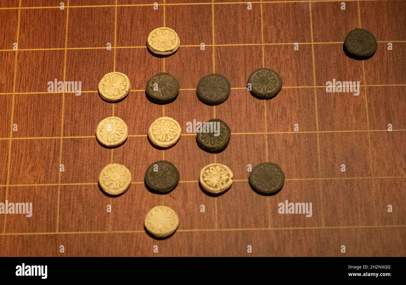 Ceramic pieces of Chinese go game in Liao dynasty (9161125) . Inner