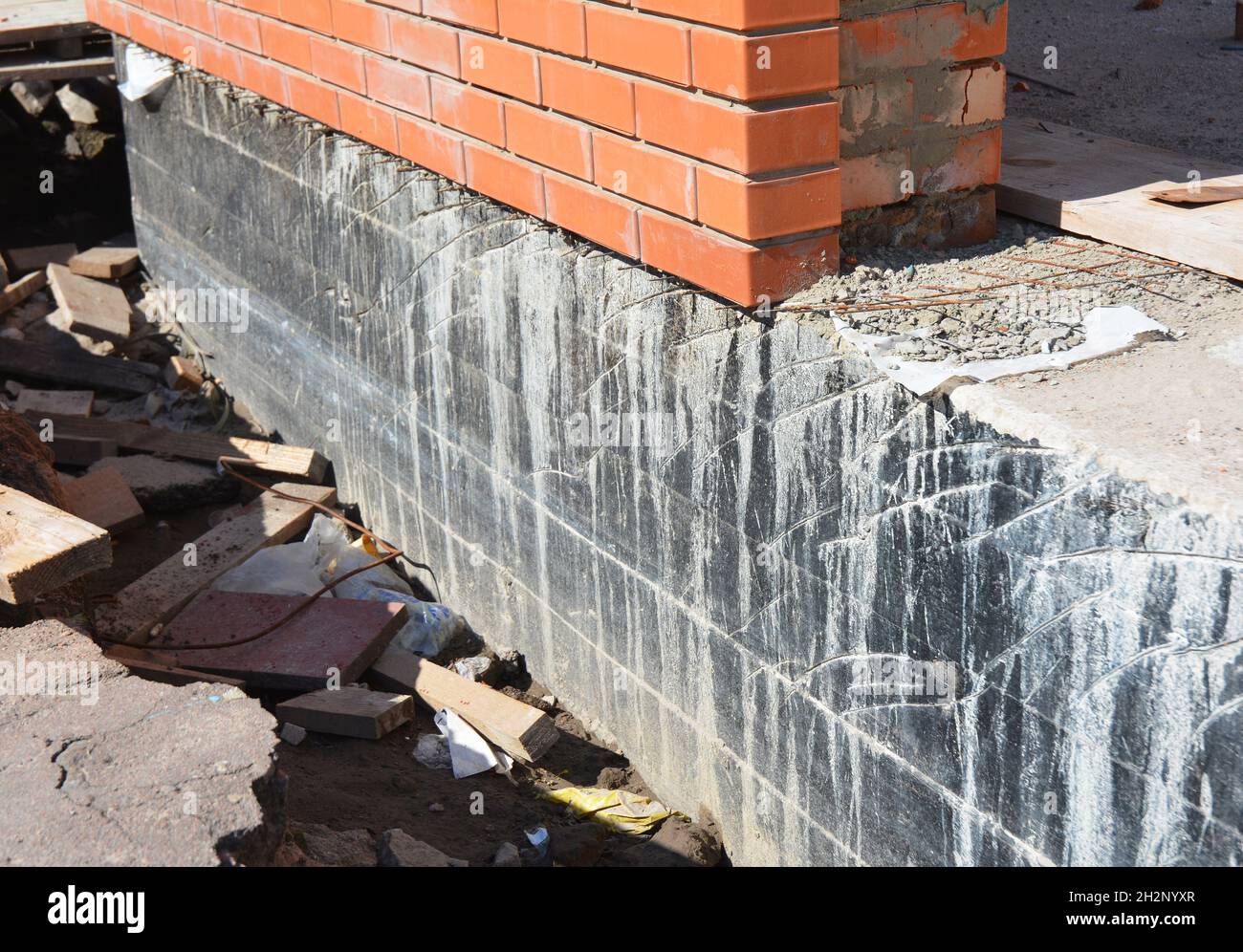 Waterproofing foundation house wall. Foundation Waterproofing and Damp