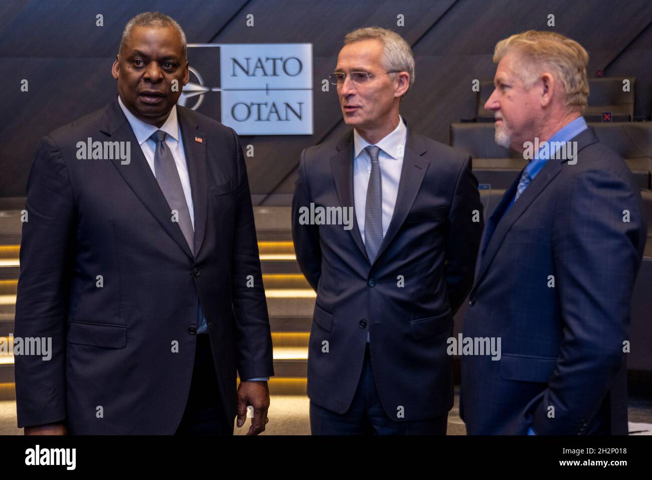 Brussels, Belgium. 22 October, 2021. U.S. Secretary of Defense Lloyd J. Austin III, chats with NATO Secretary General Jens Stoltenberg and John Manza, NATO Assistant Secretary General for Operations, right, before the start of the NATO defense ministerial meeting October 22, 2021 in Brussels, Belgium.  Credit: Chad McNeeley/DOD/Alamy Live News Stock Photo